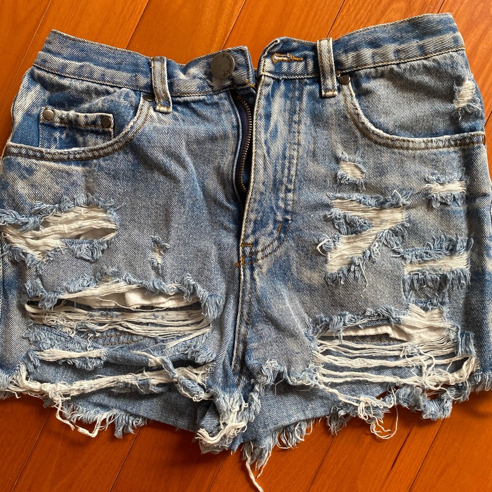 Distressed high waisted denim cut offs